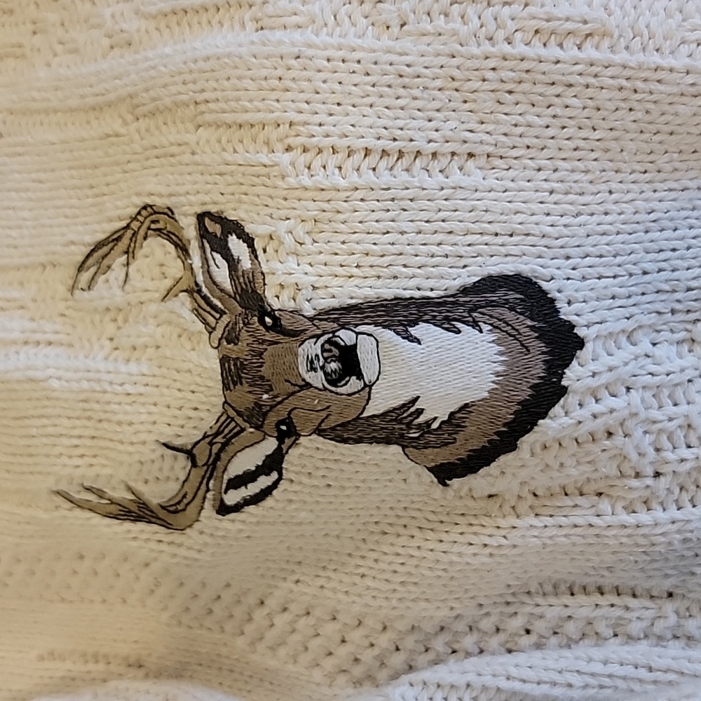 Shenandoah knit sweater cream with blue & grey. Deer bust on the front. Heavy.